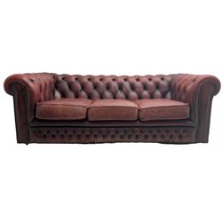 Chesterfield three-seat sofa upholstered in red buttoned leather