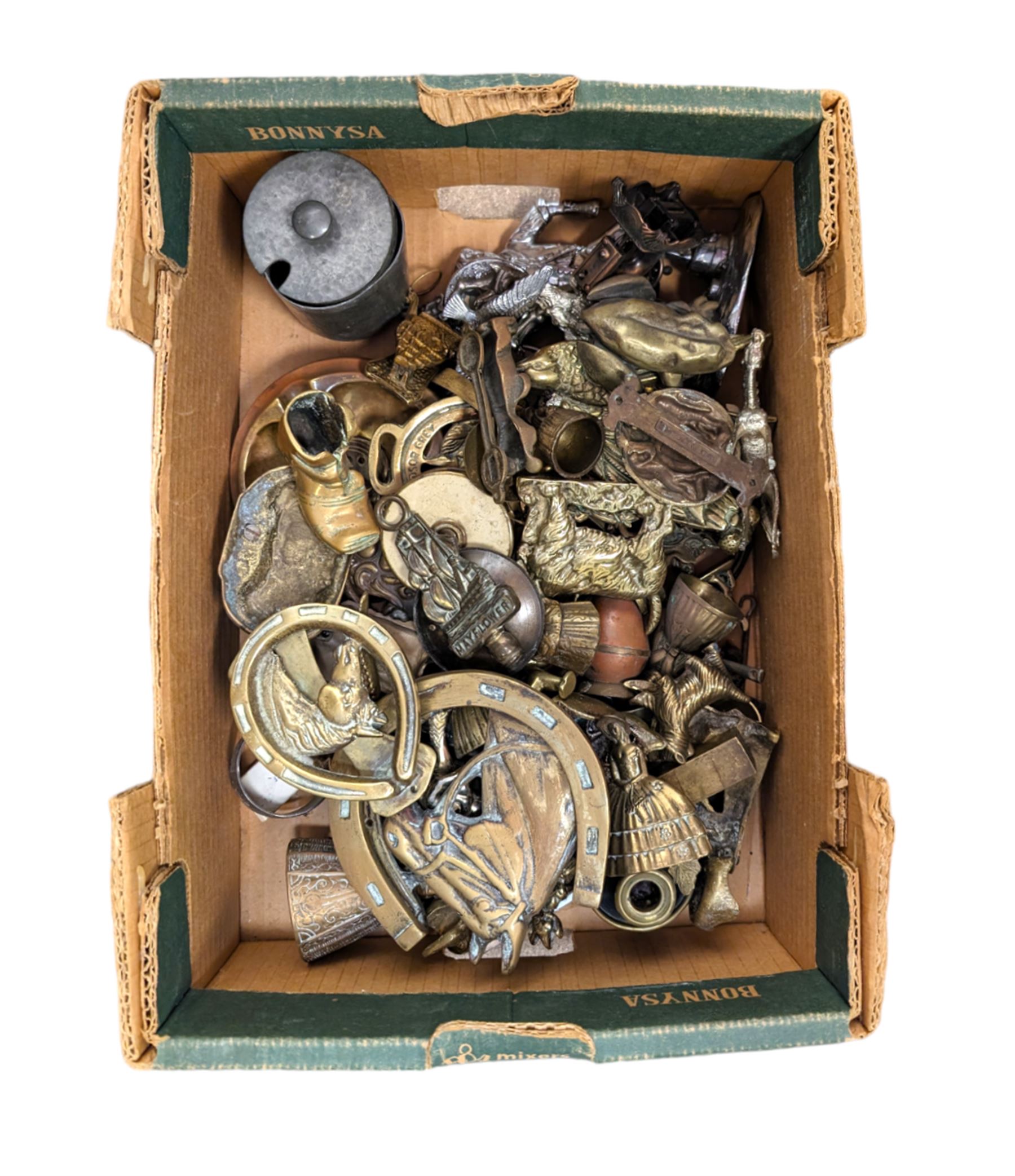 Collection of brassware, including door knockers, trinket boxes, match striker, chamberstick, etc and other metal ware