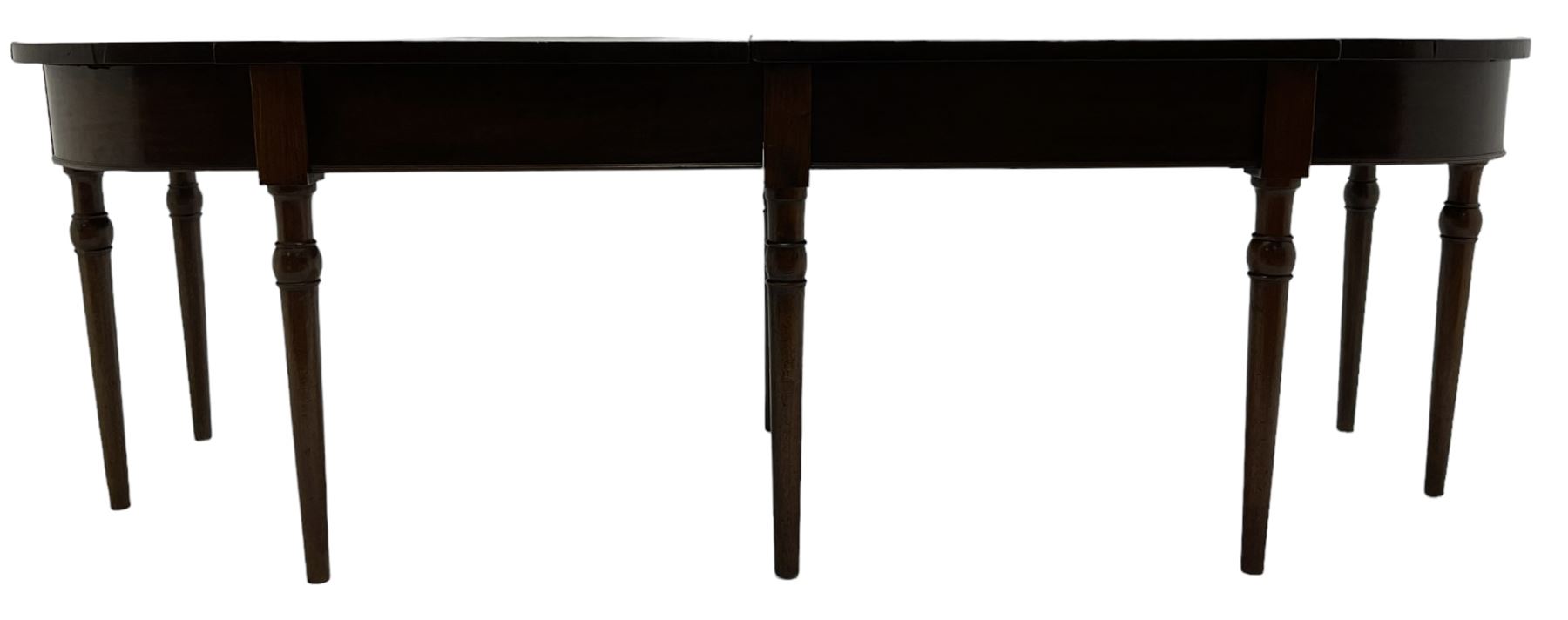 George III mahogany serving table, bow shaped top with banded frieze, raised on turned tapering supports