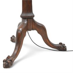 Early 20th century stained beech standard lamp, turned column with fluted and reeded decoration, on three out splayed supports with ball and claw feet, with presentation plaque and shade 