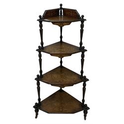 Victorian inlaid walnut corner four-tier whatnot, raised back over four graduating tiers of triangular form, decorated with satinwood and ebony inlays, united by tapering ring turned uprights, on castors