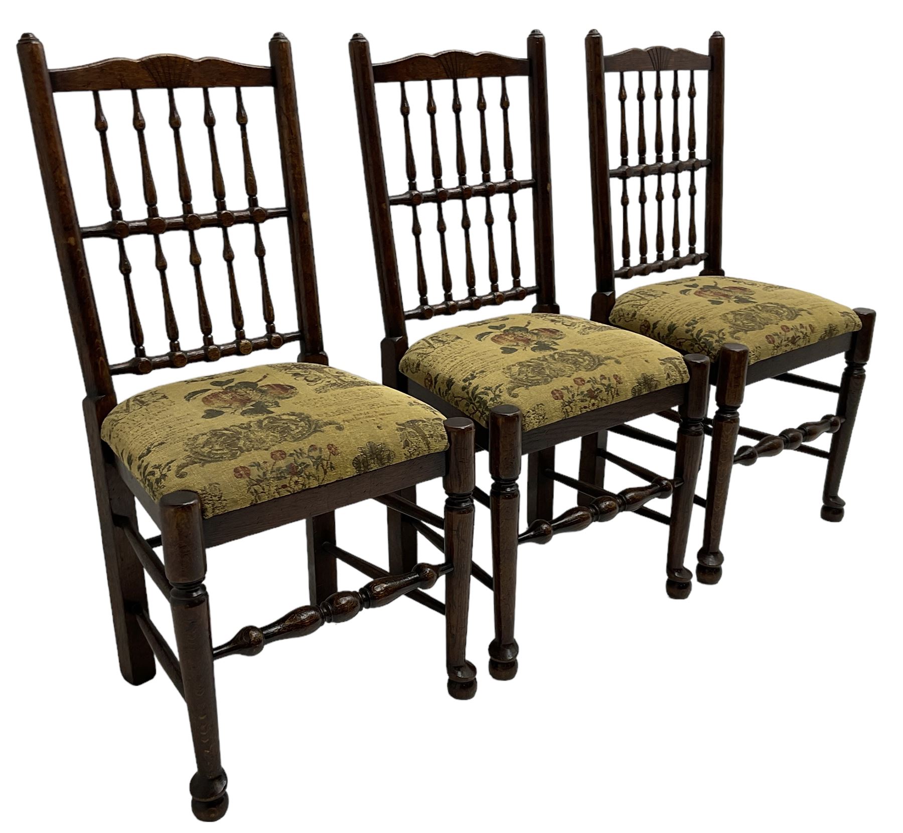 Set of six (4+2) 20th century oak spindle back dining chairs, with upholstered drop-on seat cushions, turned supports joined by turned stretchers