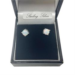 Pair of silver opal stud earrings, stamped 925, boxed 