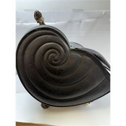 Victorian black matte metal coal scuttle, in the form of a nautilus shell, with ceramic wheels and handle, H47cm