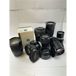 Six Minolta camera lenses, to include AF xi 35-200/4.5-5.6 serial no. 21148974, boxed, AF Zoom Xi 100-300mm 1:4.5(32)-5.6 lens serial no. 32205497, AF Zoom 28-135mm 1:4(22)-4.5 lens serial no. 1001096, MC Tele Rokkor-QF 1:3.5 f=200mm lens serial no. 5512665, MD Zoom 70-210mm 1:4 lens serial no. 1056195 and an MC Tele Rokkor-PF 1:28 f=135mm lens serial no. 1173532