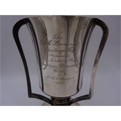 1930s silver three handled trophy, the tapering body inscribed with presentation engraving, upon stepped circular foot, hallmarked Grant & Son, Birmingham 1935, H22cm