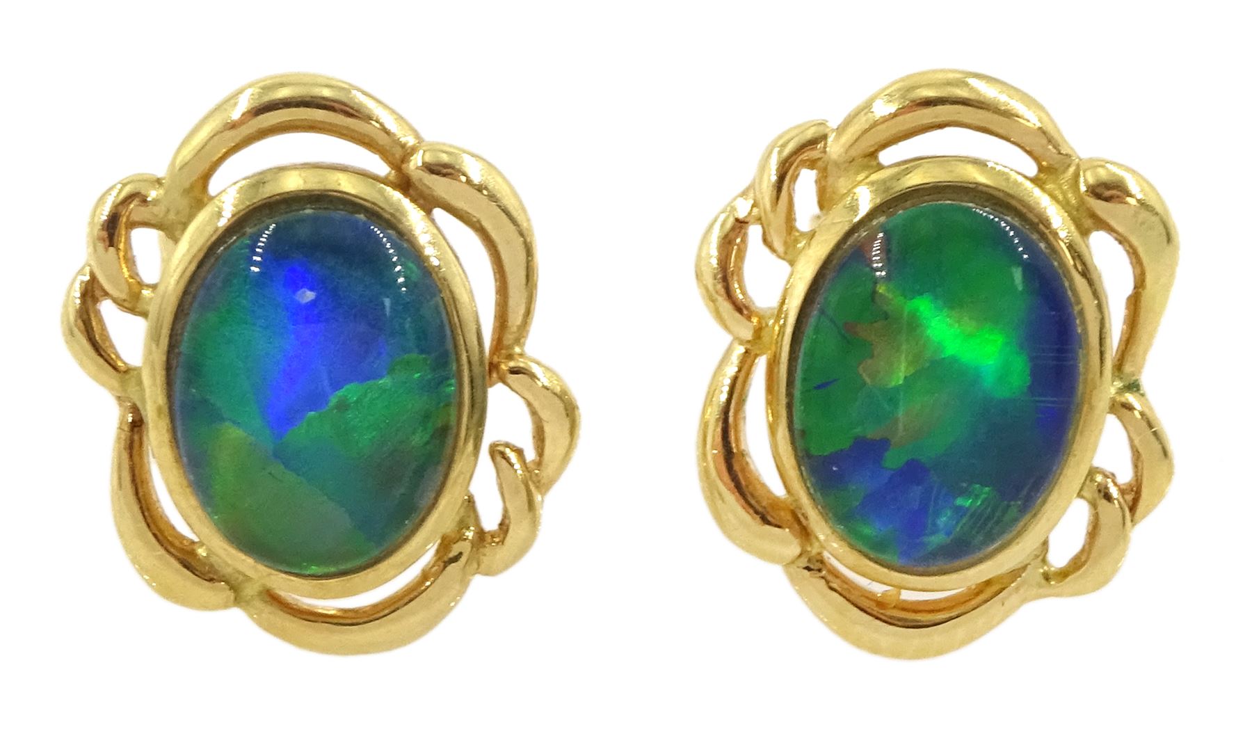 Pair of 18ct gold opal triple stud earrings, stamped