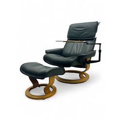 Ekornes Stressless - swivel and reclining armchair with bookrest and matching stool 