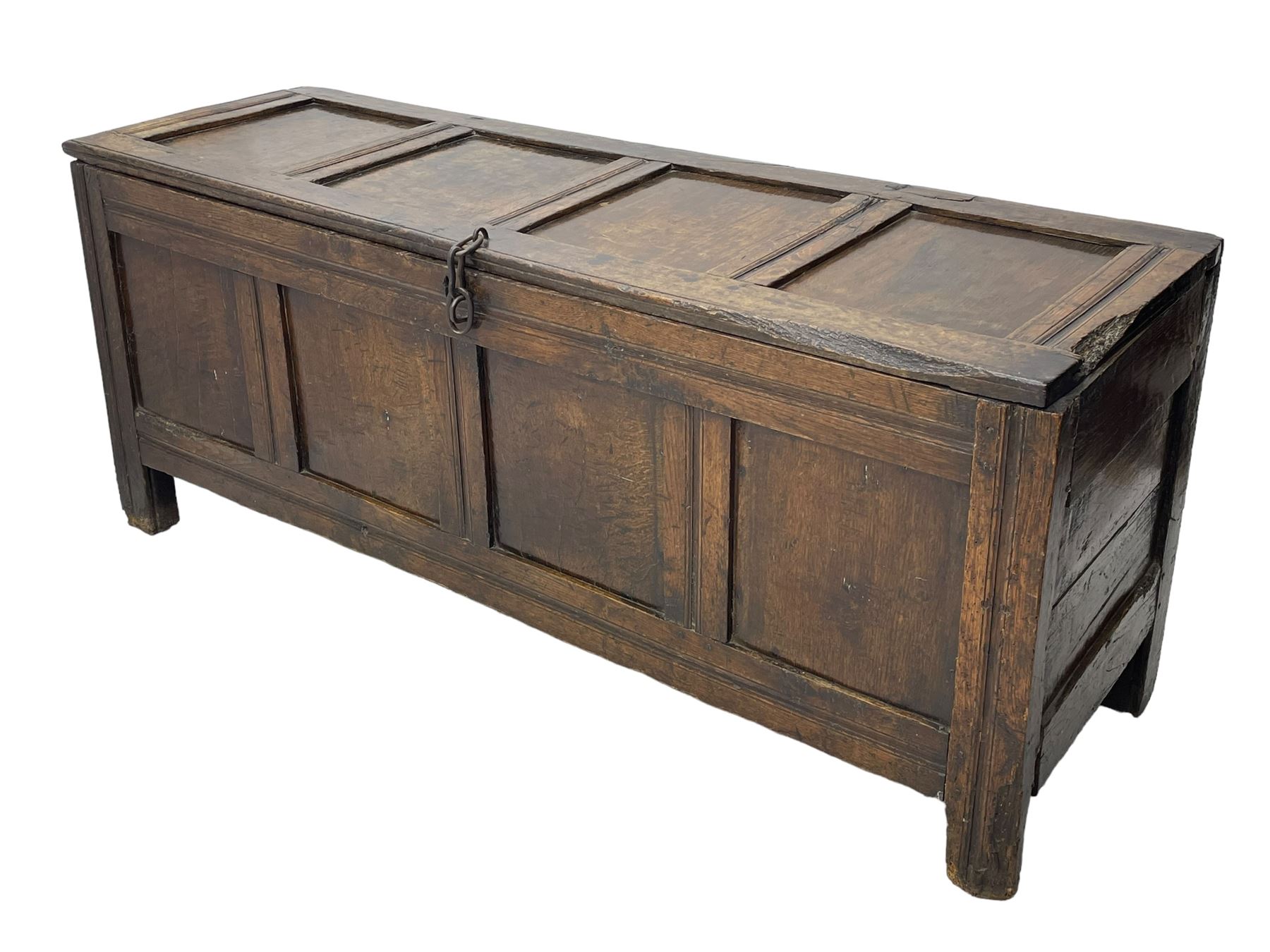 17th century panelled oak blanket chest or kist, quadruple panelled hinged lid over quadruple panelled front, moulded frame and pegged construction, on stile supports