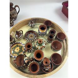 Collection of slipware, including miniature vases, baskets, candlesticks jugs etc 