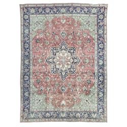 Persian rose ground rug, large central floral medallion surrounded by scrolling foliate an...