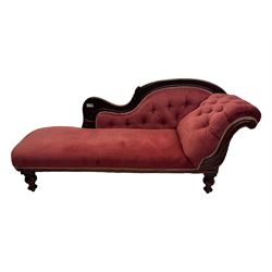 Victorian mahogany framed chaise longue, upholstered in pink velvet, the scrolled back with button-tufting, on turned feet