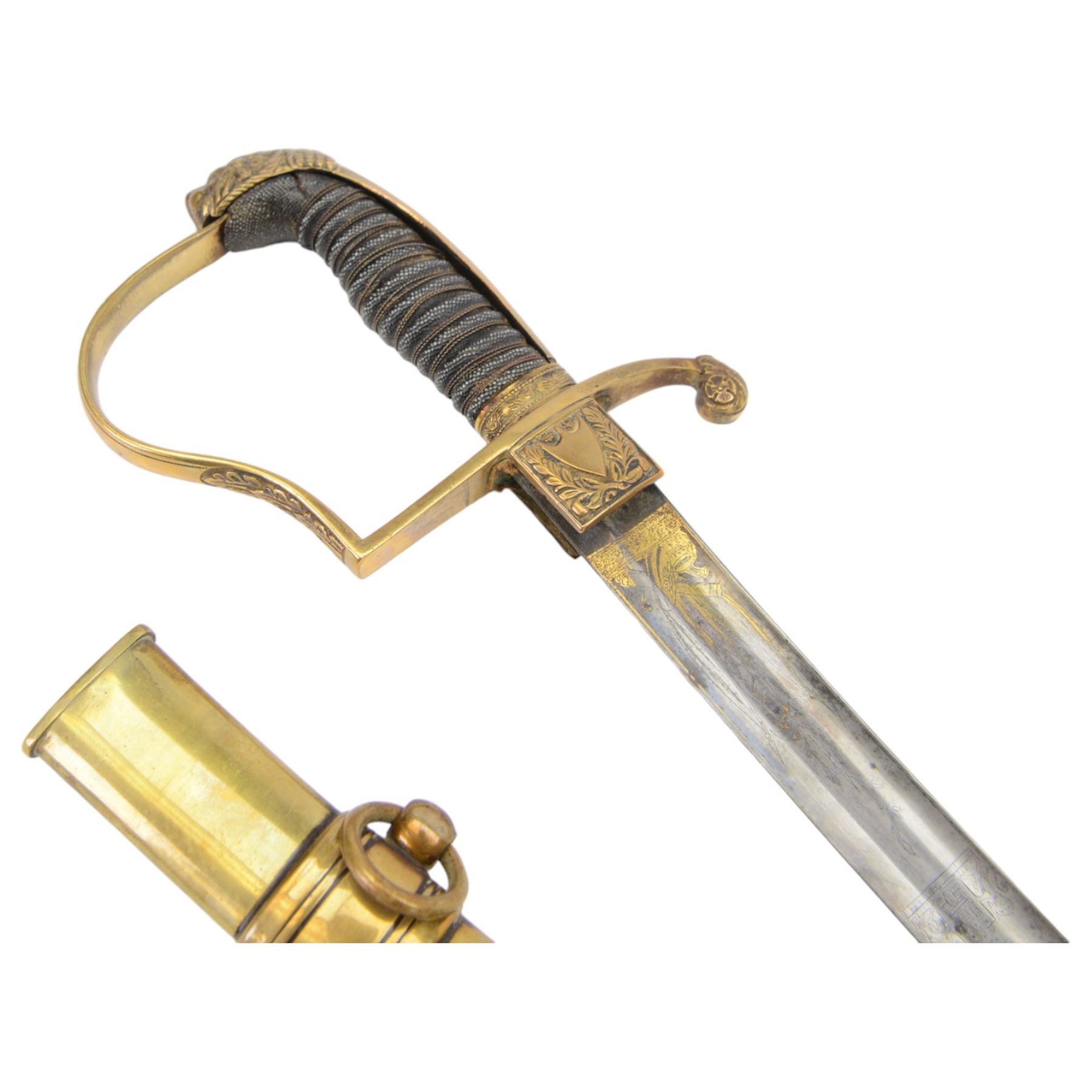 German Saxon 1st Empire Light Cavalry officer's sword c1820s, the 79cm clipped curving blade engraved with the crest of Hanover and various battle trophies with traces of blueing and gilding, brass hilt with knucklebow, foliate square langets, ornate downswept quillon, wire-bound fish skin grip with lion's head pommel; in brass scabbard with two suspension rings L95cm overall