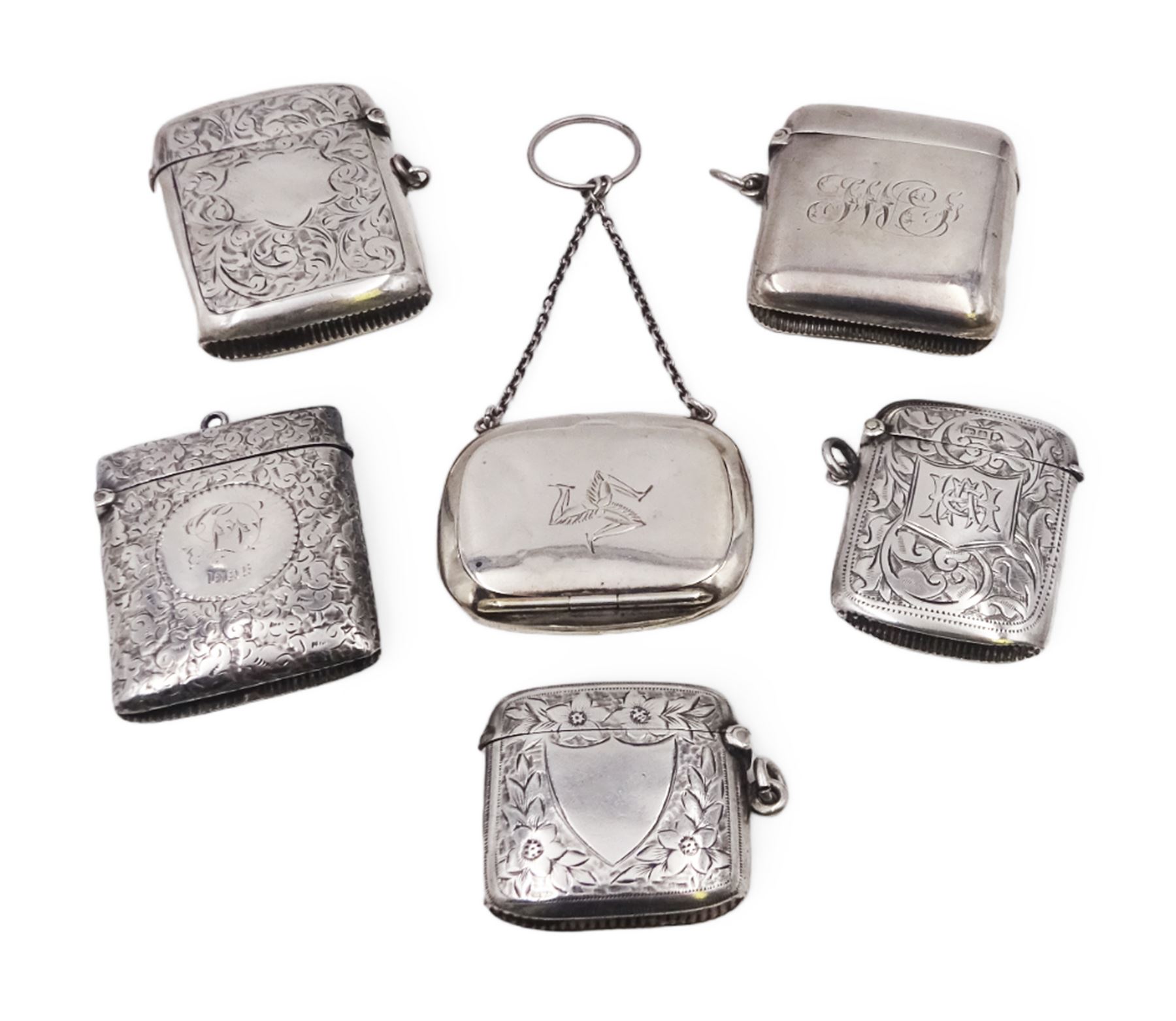 1920s silver miniature purse, engraved with triskelion symbol to hinged cover, hallmarked Adie & Lovekin Ltd, Birmingham 1920, together with five early 20th century silver vesta cases, all of typical form, engraved with foliate and scrolling details, all hallmarked