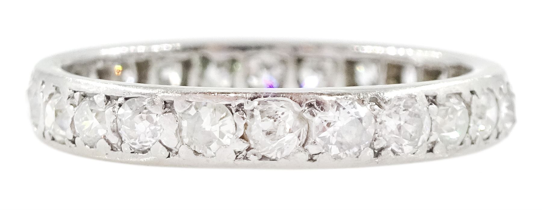 Early 20th century platinum channel set old cut diamond full eternity ring, total diamond weight approx 1.45 carat