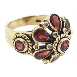 9ct gold garnet and diamond flower head cluster ring, Birmingham 2002 