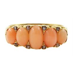 Early 20th century 18ct gold five stone graduating coral ring, with diamond accents set be...