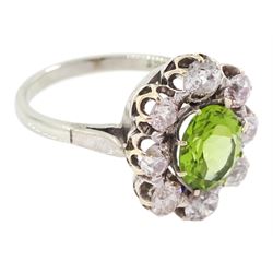 18ct white gold oval cut peridot and old cut diamond cluster ring, stamped 18ct, total diamond weight approx 1.20 carat