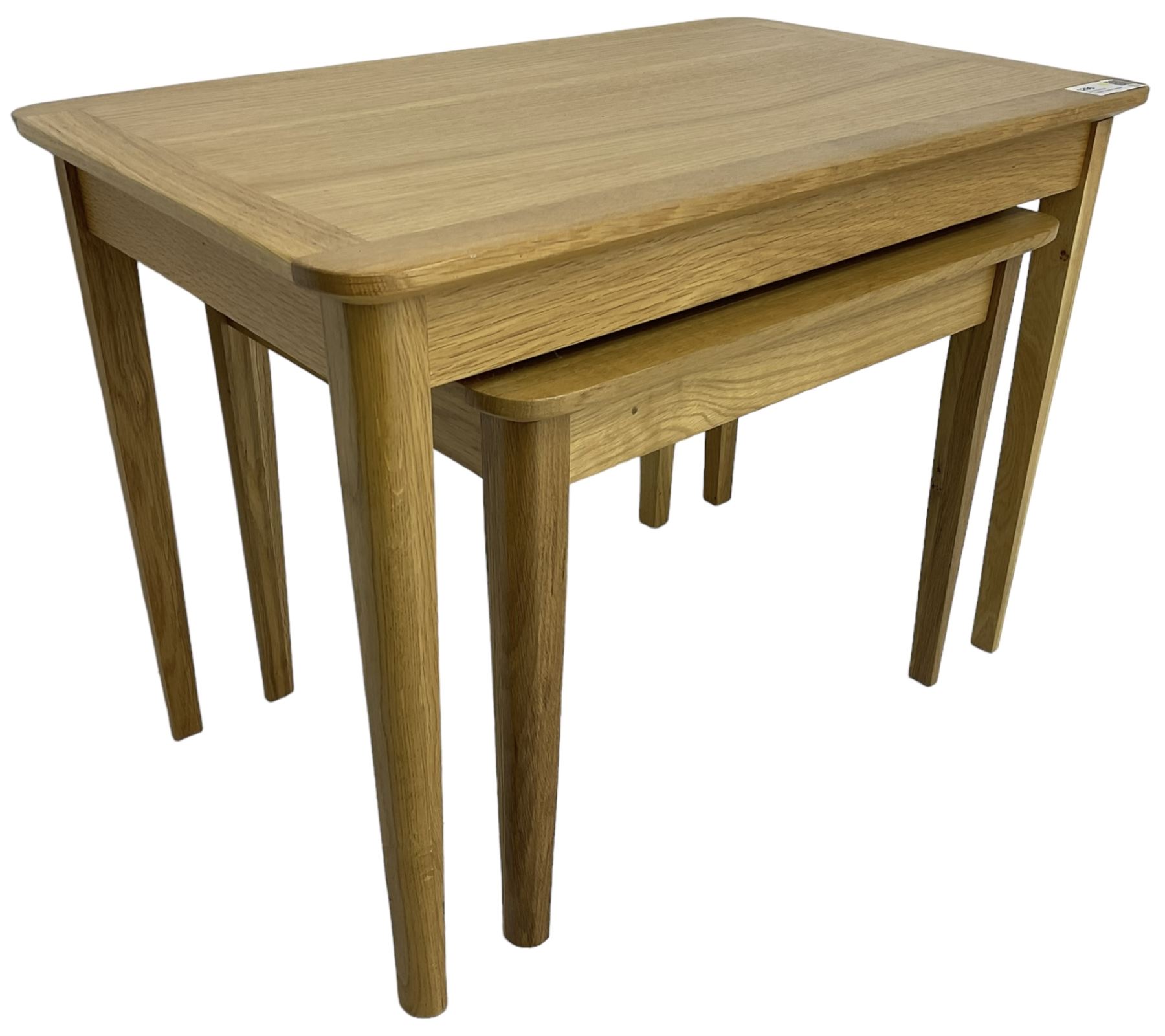 Contemporary light oak nest of two tables, rectangular top over tapering supports