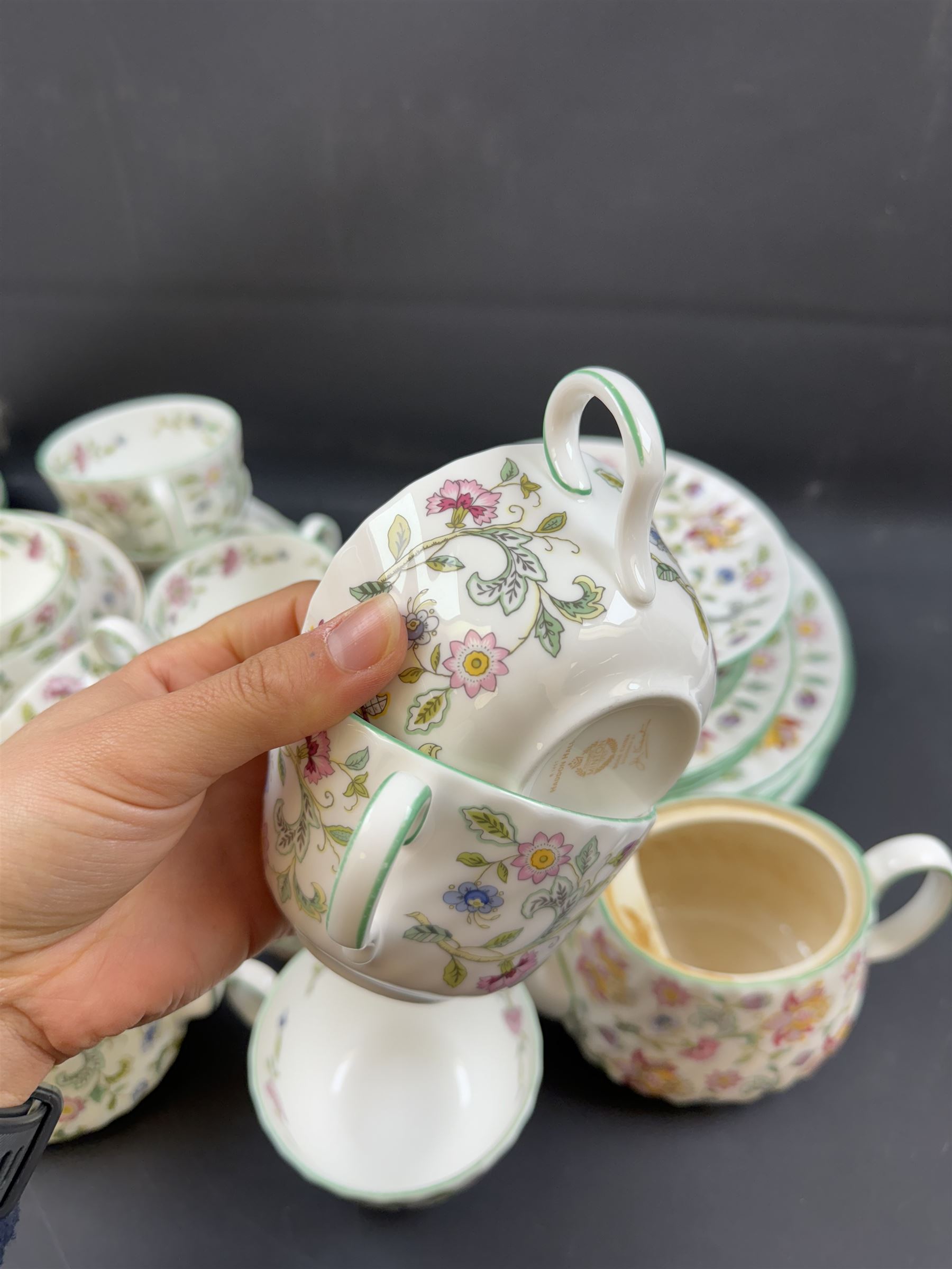 Minton Haddon Hall pattern part tea service, including milk jug, open sucrier, teacups and saucers, dessert plates etc