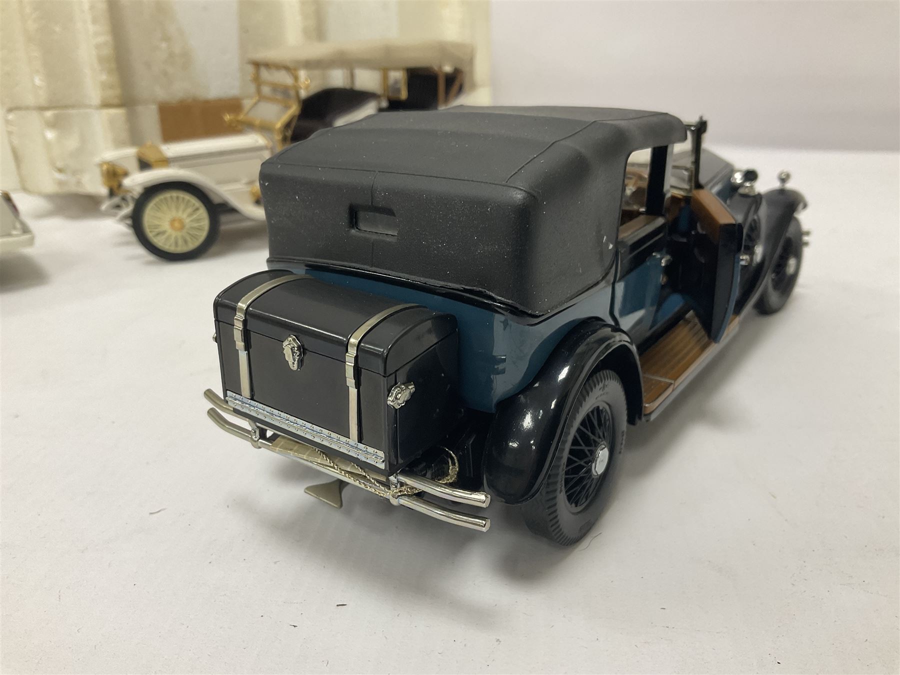 Franklin Mint - six 1:24 scale die-cast Rolls-Royce models comprising 1907 Rolls-Royce ‘The Silver Ghost’, boxed with original packaging and paperwork, 1929 Rolls-Royce ‘Phantom I’ with original packing, 1914 Rolls-Royce, 1911 Rolls-Royce, 1955 Rolls-Royce ‘Silver Cloud 1’, and 1992 Rolls-Royce Corniche IV 