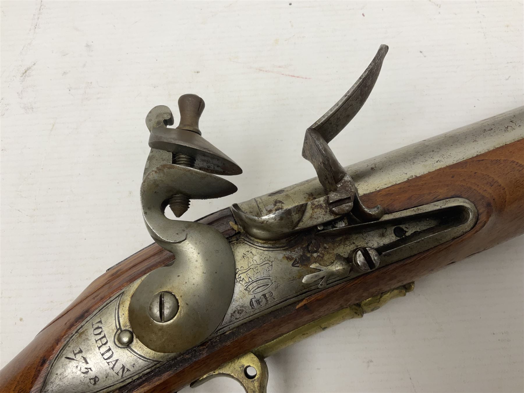 Brown Bess style 10-bore flintlock musket, the action marked with Crowned GR, 'Jordan' and dated 1758, the 104cm(41