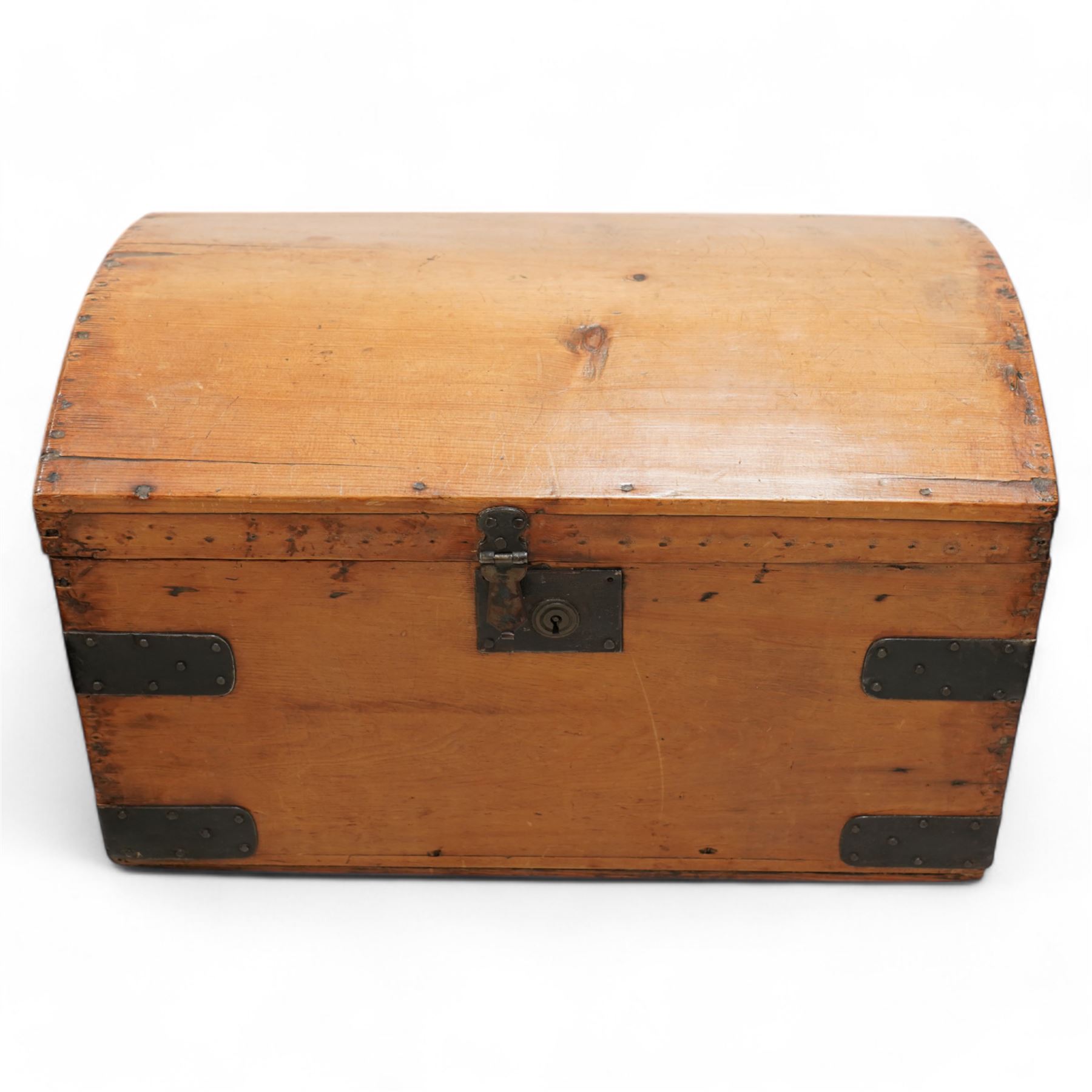 19th century pine and metal bound dome top trunk (W61cm); four 19th century grain bushels; pine cutlery basket with wrought iron handle; rectangular wooden crate with carry handle; egg stand with a timer converted from a large bobbin (8)  