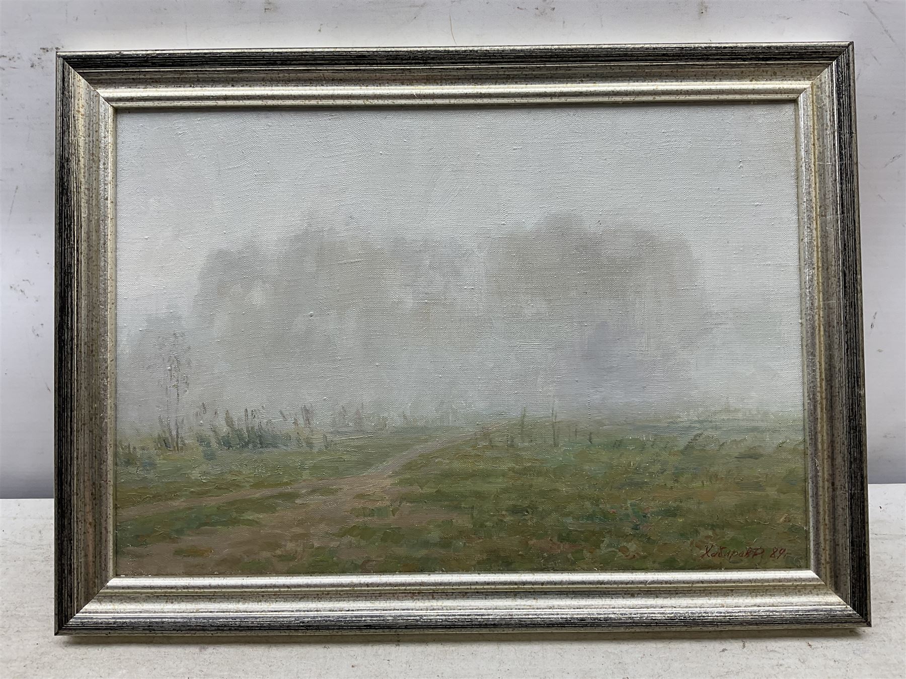 Rashit Habirov (Russian 1953-): Misty Landscape, oil on canvas signed and dated '89, 23cm x 34cm 