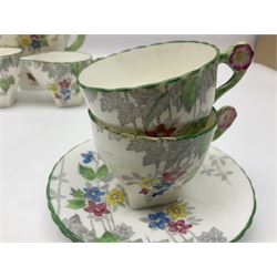 Art Deco Delphine China coffee service for six, comprising coffee pot, open sucrier, milk jug, cups and saucer, with floral decoration