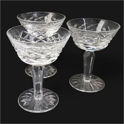 Suite of Waterford Tyrone pattern crystal to include six water goblets, H18cm, six red wine glasses, H17cm, seven white wine glasses, H16cm, six champagne flutes H18cm, six port glasses H14cm, nine champagne coupes, eight tumblers, six dessert bowls and serving/ fruit bowl