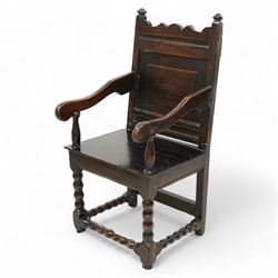 17th century and later oak wainscot chair, shaped cresting rail over panelled back, down sweeping dished arms over plank seat, on bobbin turned supports united by bobbin turned stretchers 