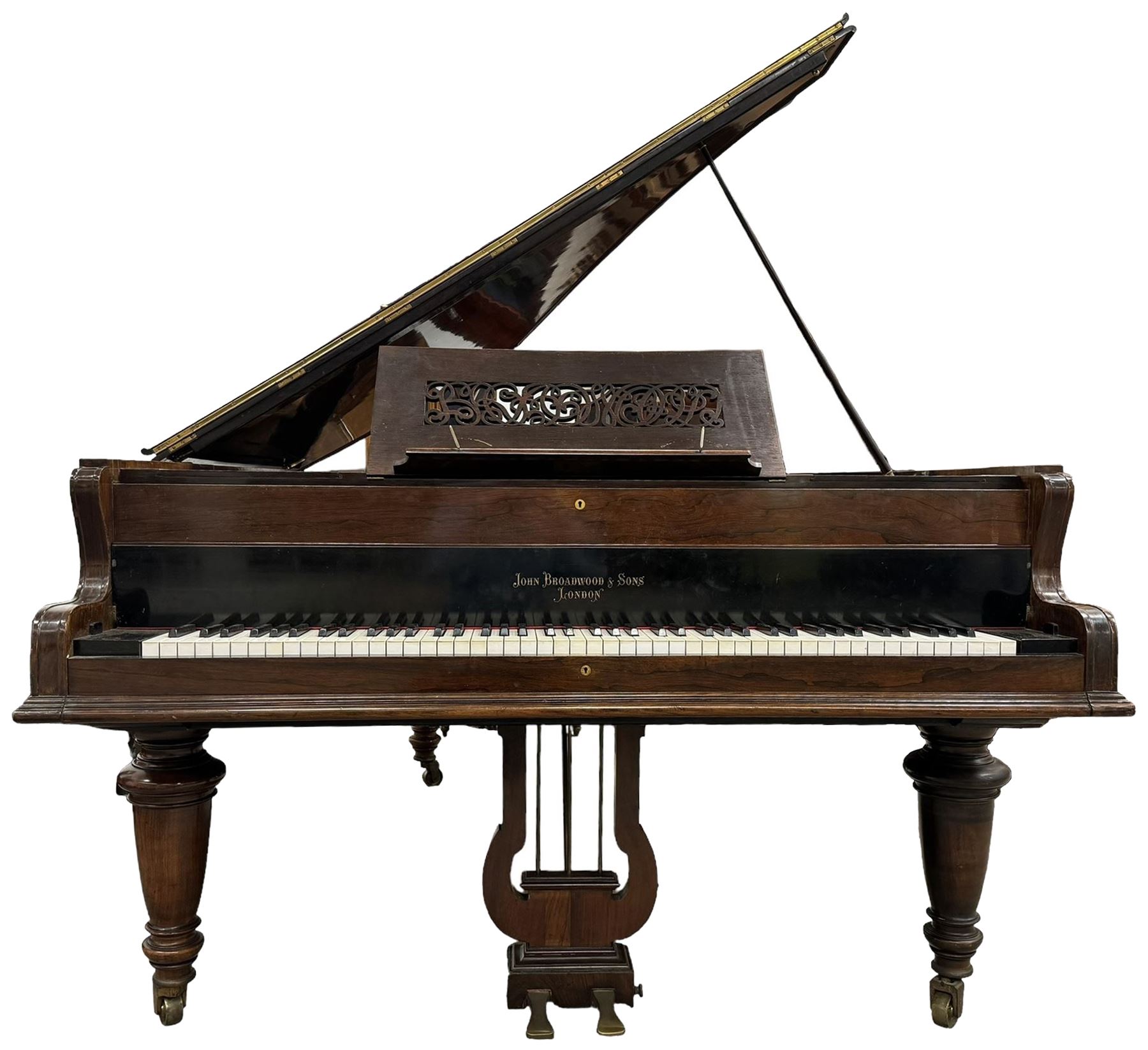 John Broadwood & Sons London - 19th century rosewood grand piano serial  No 47356 (1900-1910) overstrung cast iron frame with 88 notes, 7 octaves, Lyre with sostenuto and una-corda pedals, split-hinged key fall board and fretted music desk, case raised on three taper turned legs with brass castors, original stringing, felt, hammers, dampers and grand roller action.

This item has been registered for sale under Section 10 of the APHA Ivory Act