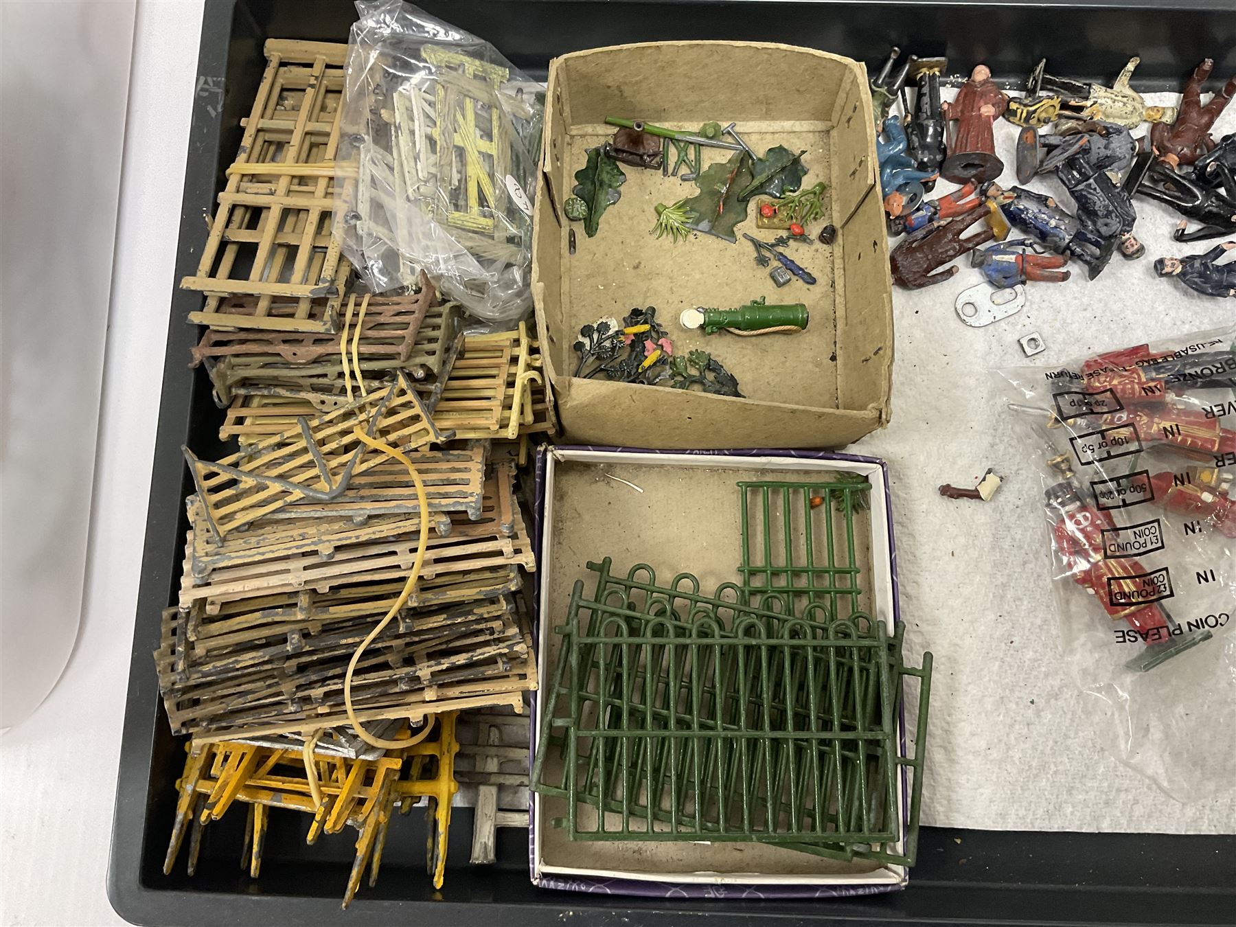 Large quantity of playworn 1950s Britains and other lead figures including farm and zoo animals, horse drawn carts, fencing etc