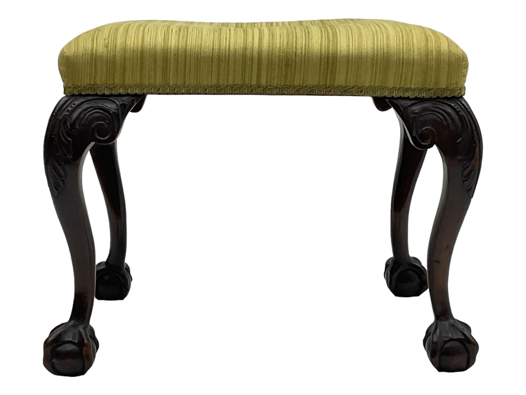 Georgian design mahogany cabriole stool, rectangular top upholstered in green fabric, on scrolled acanthus leaf carved cabriole supports with ball and claw feet