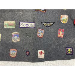 Boy Scout Interest; Scout blanket with collection of Boy Scouts cloth insignias and similar, to include badges from Lealholm North Yorkshire, Cleveland Country, South Shields etc, approximately 115 badges  