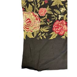 Embroidered Karandi fabric runner, the field featuring a black ground with an all-over floral design, including large pink and cream roses, accompanied by green leaves and small blossoms, bordered by plain sections at each end