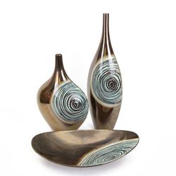 Two bottle neck vases of graduating size, decorated in copper lustre with stylised circle ...