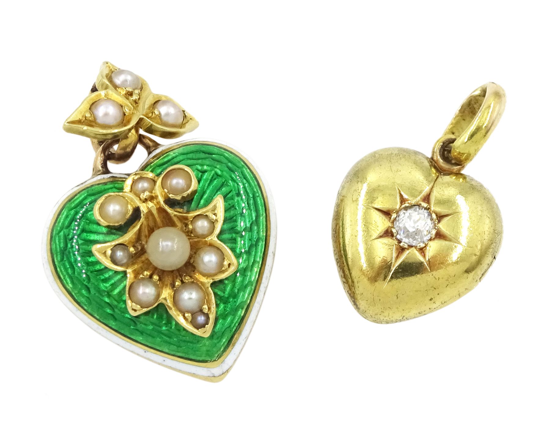 Victorian gold single stone old cut diamond, hinged locket heart pendant, stamped 15 and one other Victorian 15ct gold green enamel heart pendant, with white enamel border, applied gold pearl decoration and split pearl leaf bail, the reverse with glazed locket and engraved 21st June 1899