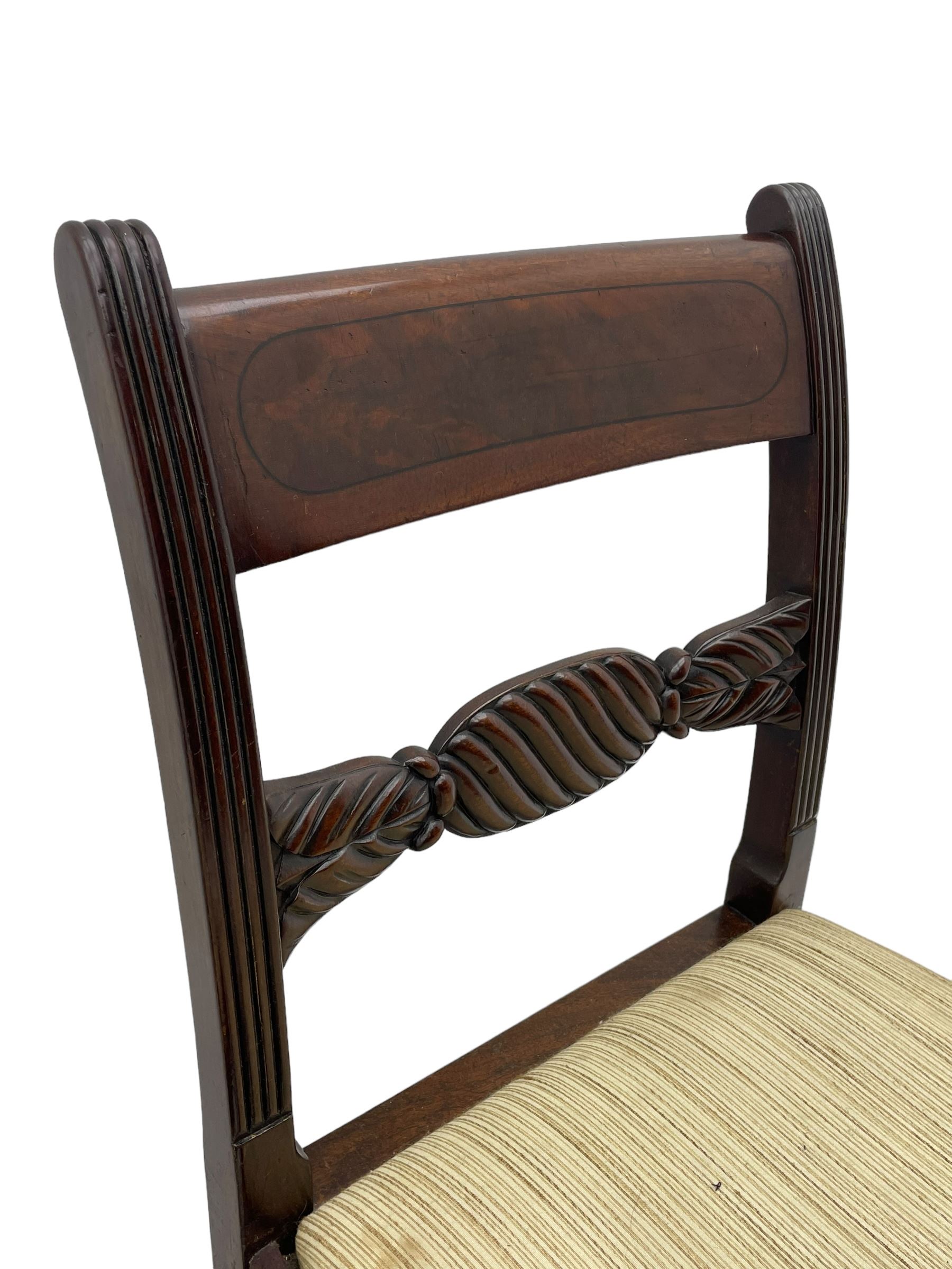 Georgian design set of six (6+2) mahogany dining chairs, the bar cresting rail inlaid with figured mahogany panel, shaped twist lobe carved middle rail with extending stylised leaf decoration, upholstered drop-in seat, on turned front supports 