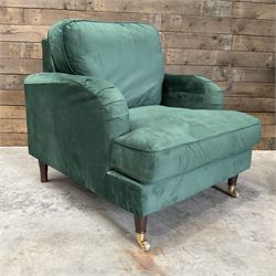 Pair of Howard design armchairs, upholstered in jade green velvet fabric