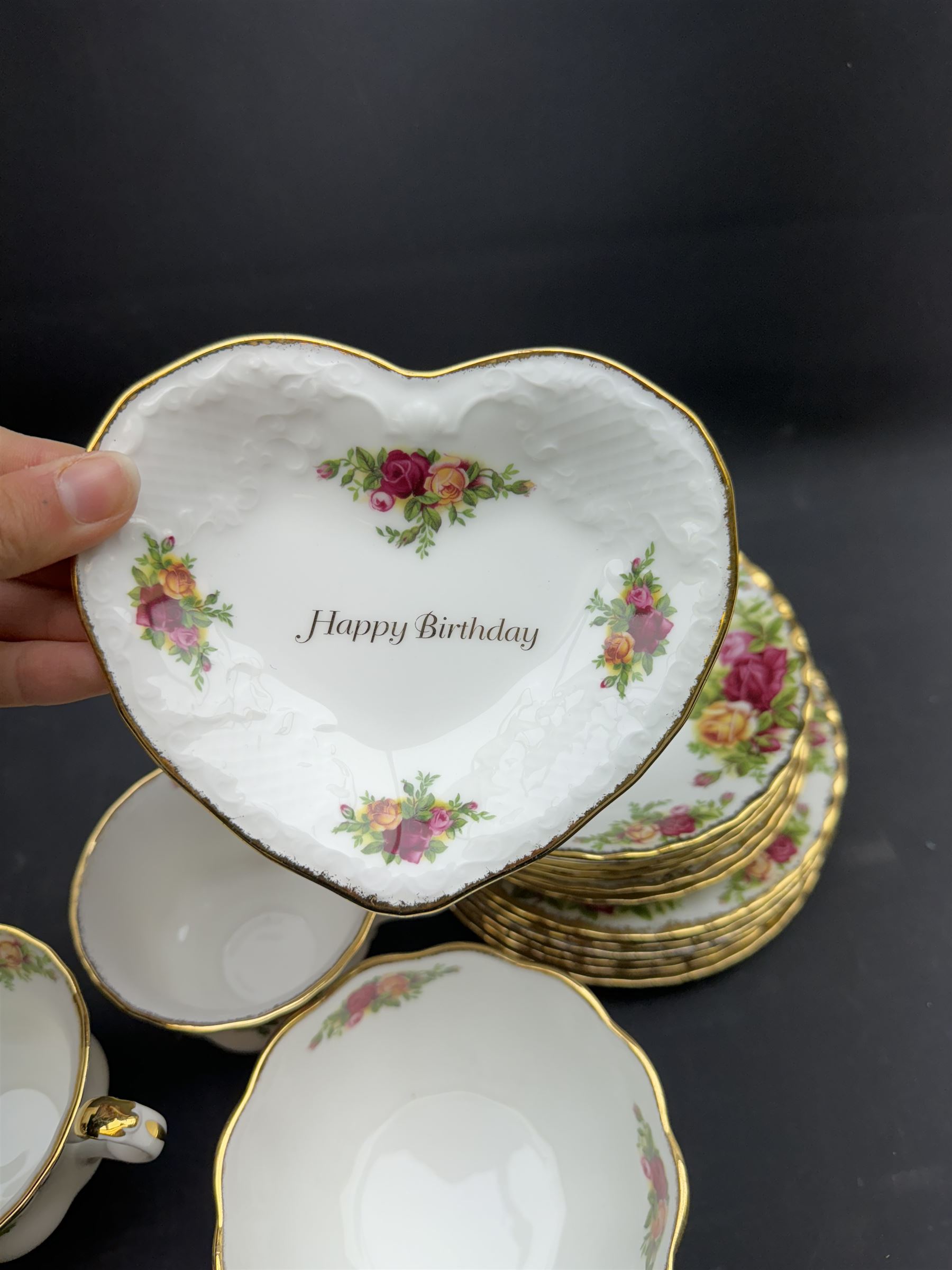 Royal Albert Old Country Roses tea service for six, comprising teapot, milk jug, open sucrier, cups and saucers, dessert plates, two trinket dishes covered jar and clock