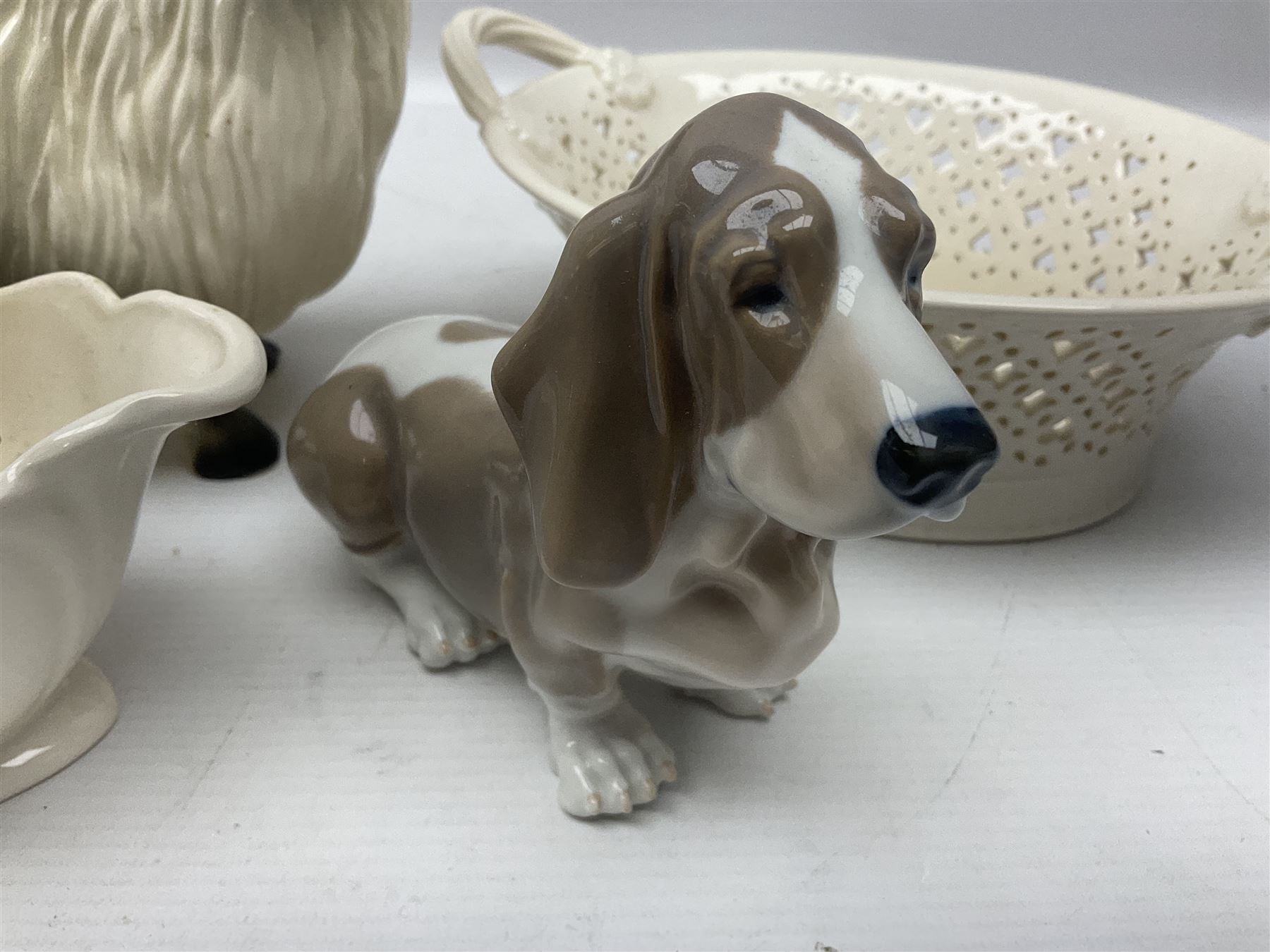 Royal Copenhagen basset hound, together with Coopercraft ram and Leeds Pottery creamware 