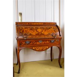 19th century Dutch marquetry cylinder bureau or desk, the cylinder roll inlaid with scrolling acanthus leaves and putti riding dolphins, hook scrolling border, the interior fitted with small drawers, pigeon holes and retractable writing surface, single drawer below inlaid with trailing foliate branches, on cabriole supports with gilt metal mounts