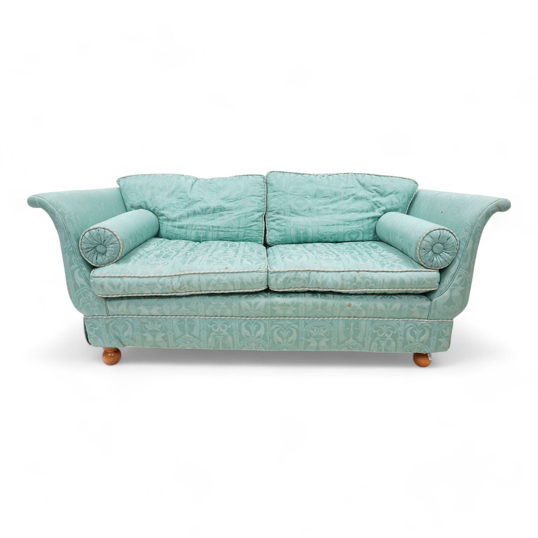 Regency shaped hardwood-framed two-seat sofa, upholstered in turquoise fabric decorated with arches enclosing birds of paradise and seahorses, on turned bun feet 