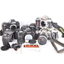 Collection of Nikon cameras, to include F60 serial no. 2574507, boxed, F70 serial no. 2807667, F75 serial no. 2062602, with an AF Nikkor 28-100mm 1:3.5-5.6 G lens serial no. 2166614, two F80 examples serial nos. 2553343 & 2777869, two F90X examples serial nos. 2209737 & 2438888, one boxed and an F100 serial no. 2051550