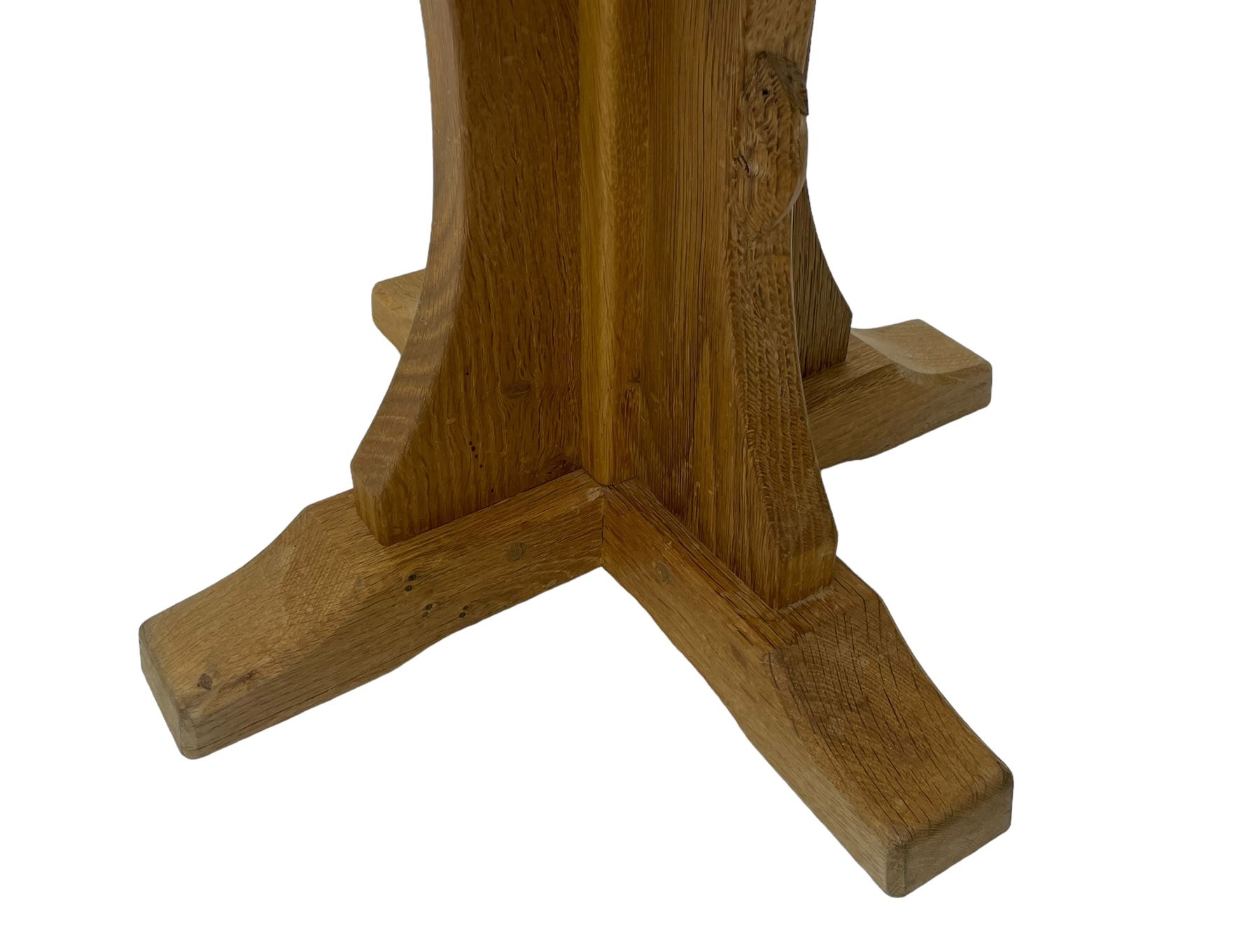 Mouseman - oak occasional table, octagonal adzed top, cruciform pedestal on sledge feet, carved with mouse signature, by the workshop of Robert Thompson, Kilburn 