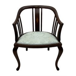 Edwardian inlaid mahogany tub-shaped armchair, curved backrest with inlaid central splat with diamond motif, over padded upholstered seat in pale blue damask fabric, on cabriole supports