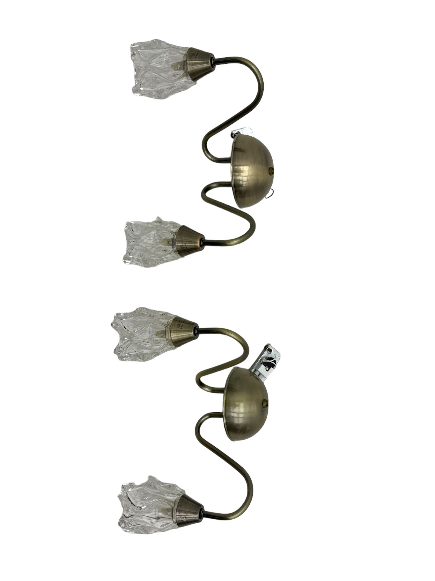 Contemporary five-branch chandelier, brass effect with moulded glass shades; matching pair of wall-mounted two-branch lights (3)