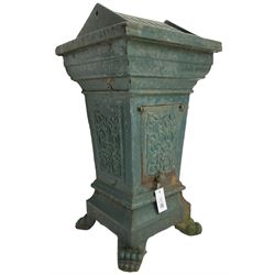 Early 20th century cast iron litter bin, square tapering form with scrolling foliate decoration, on paw feet