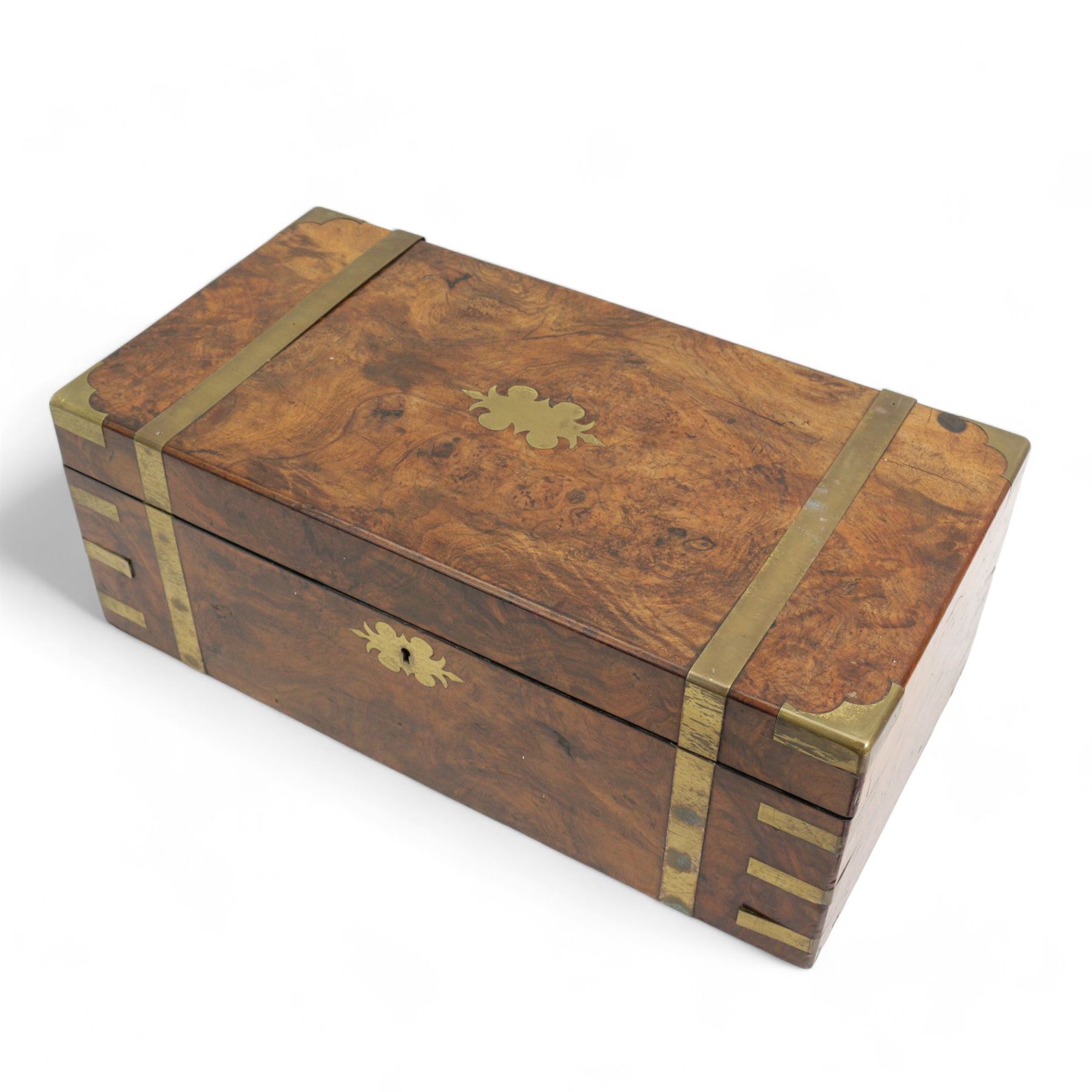 19th figured walnut and brass bound writing slope, the hinged cover opening to reveal a tooled black leather writing surface, pen tray and various compartments, L50cm x H18.5cm